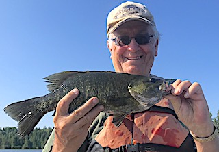 GREAT BIG Smallmouth Bass Great Big Smile by John Fishing at Fireside Lodge in Canada  